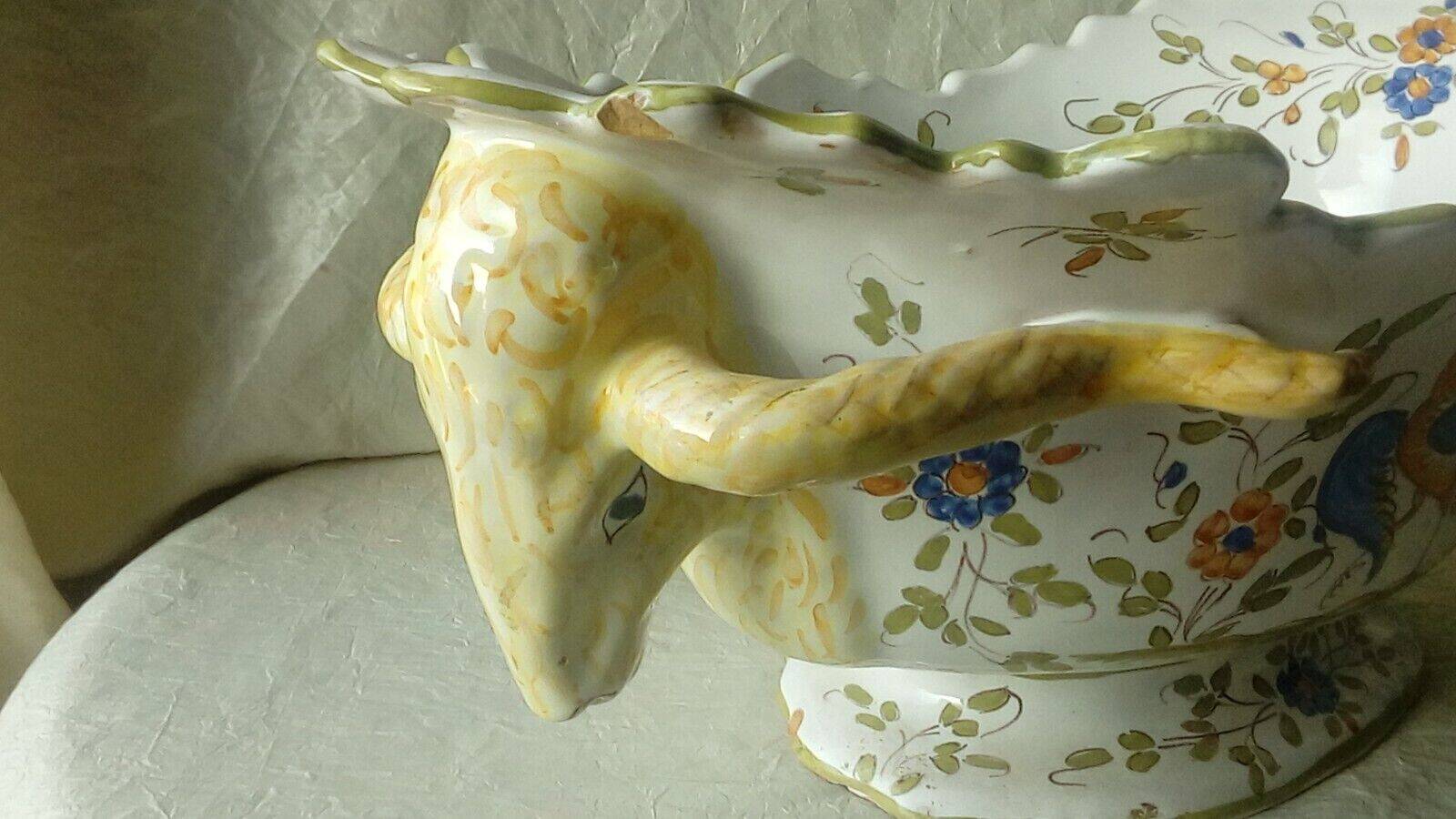 Moustiers earthenware planter with ram's head