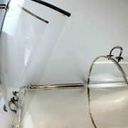 Large serving platter with lid, in silver metal.