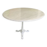 Round marble table with central cast iron leg