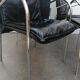 Set of 4 armchairs with chrome base and leather vintage design 1980