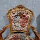 Pair of Louis XV style Baroque armchairs in gilded and carved wood circa 1900