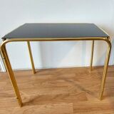 Vintage 1970 gold metal nesting tables.