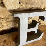 Letter metal - e