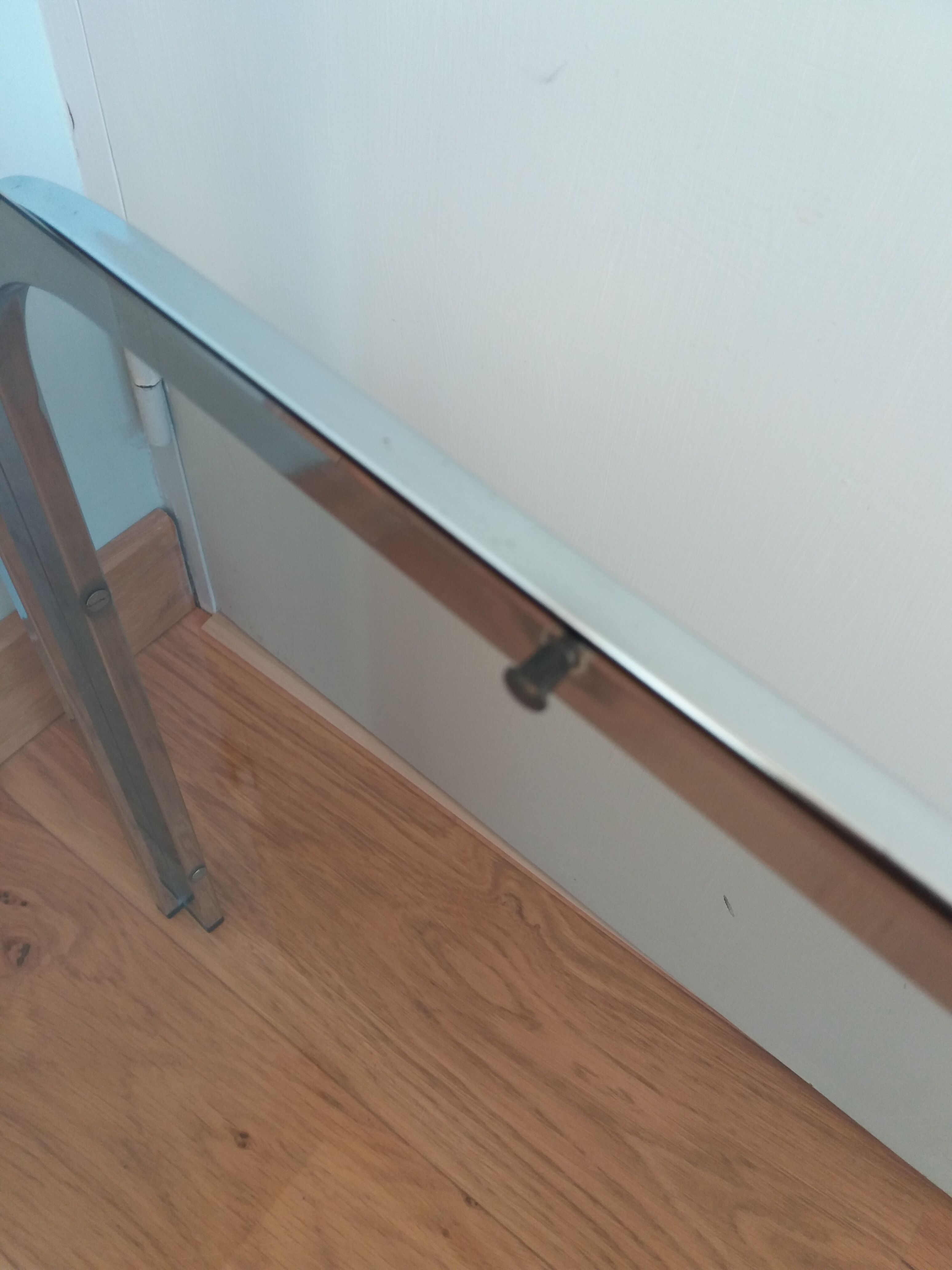 Square coffee table in chromed metal and smoked glass