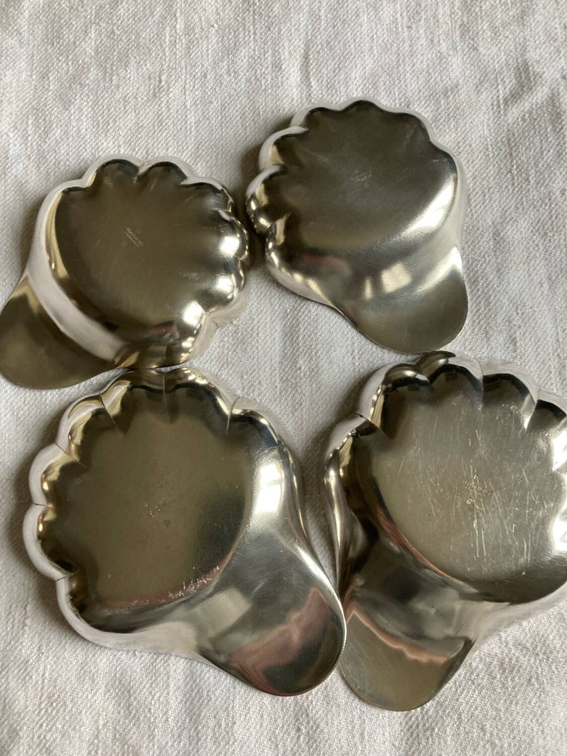 4 silver metal cups