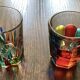 Two Shot Glasses,: One Murano, One CC Zechin using Murano Techniques.