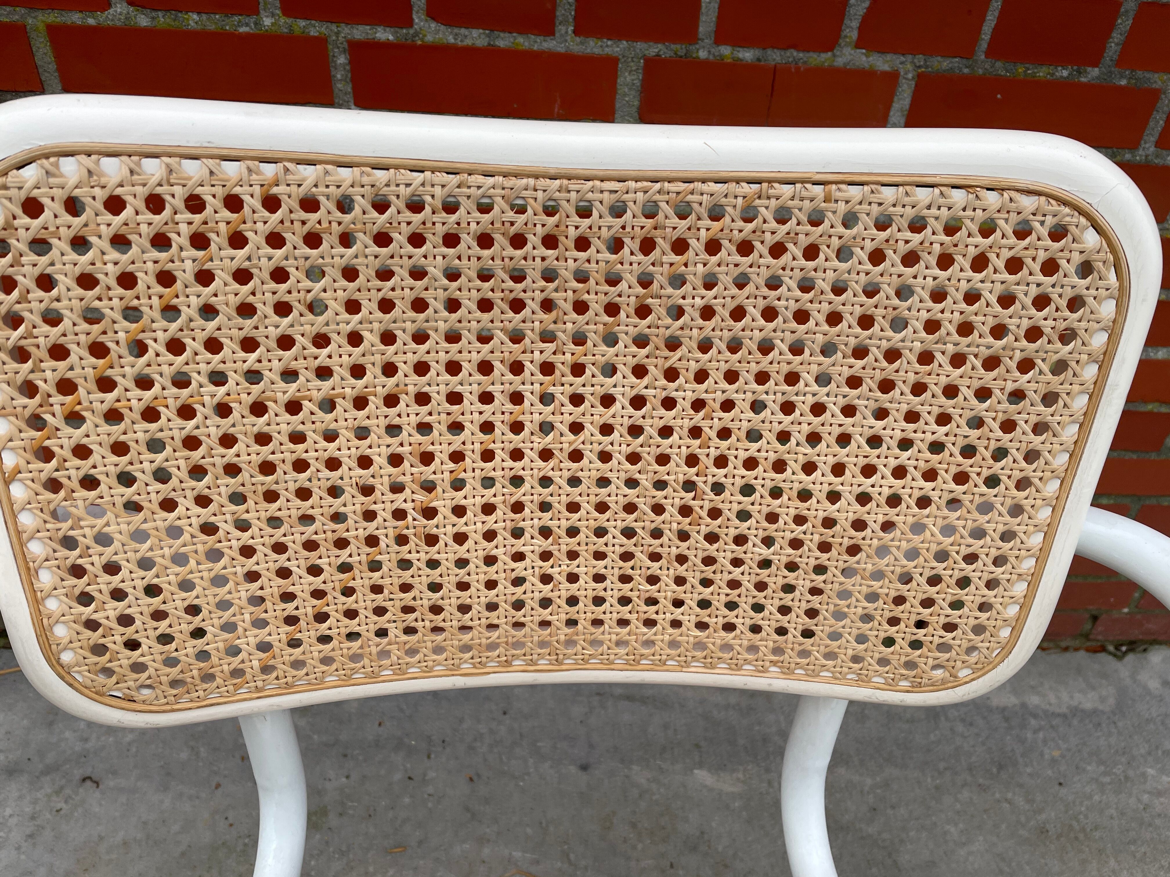 Cesca chair model with armrest in white