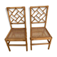 Pair of matching mid century bamboo and cane chairs