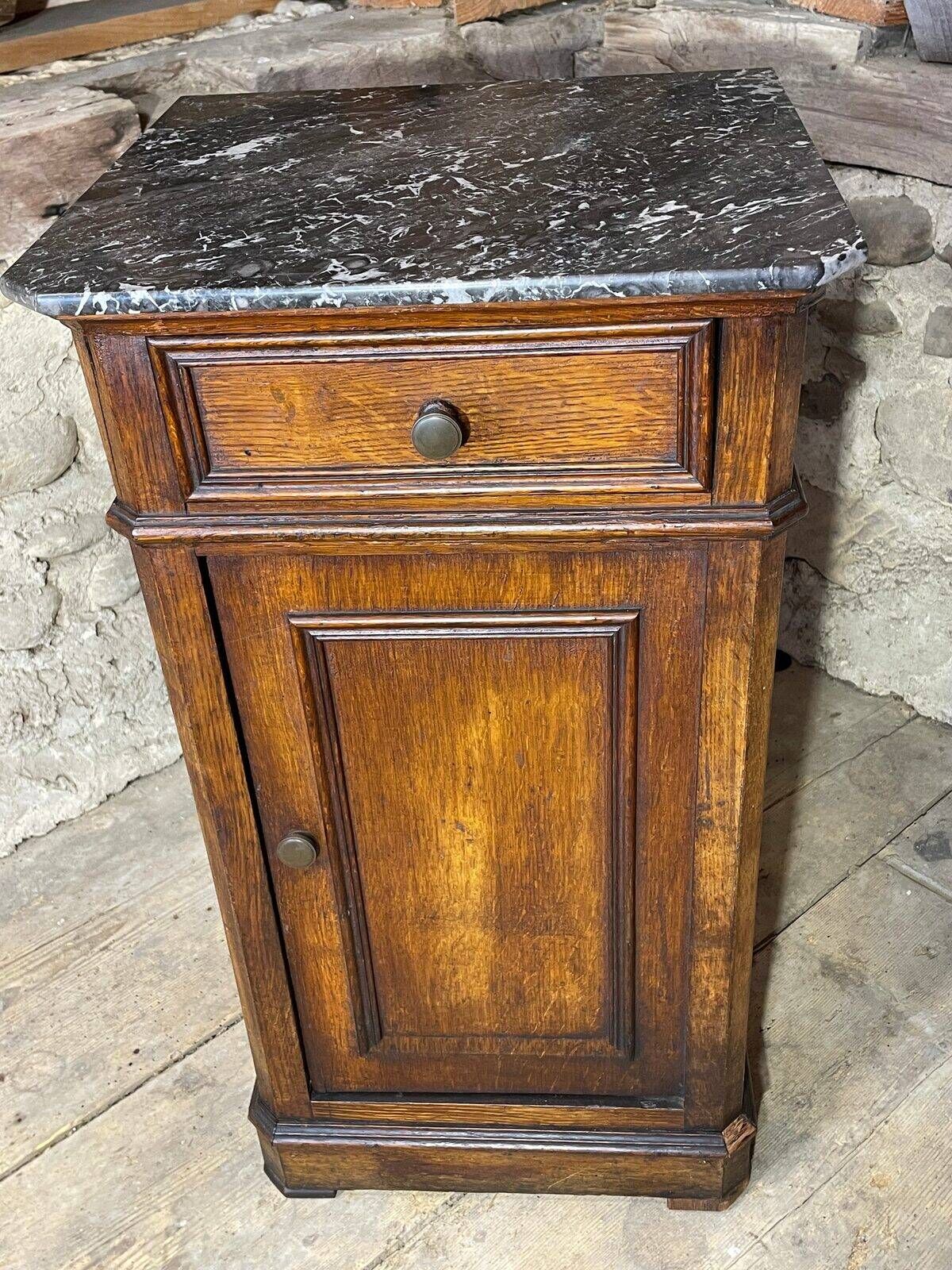 Provincial antique bedside table in oak, marble top, late 19th century.