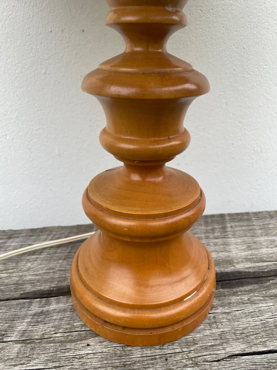 Turned wood lamp with flower shade