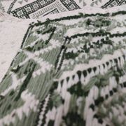 Tapis blanc et vert tissé mains