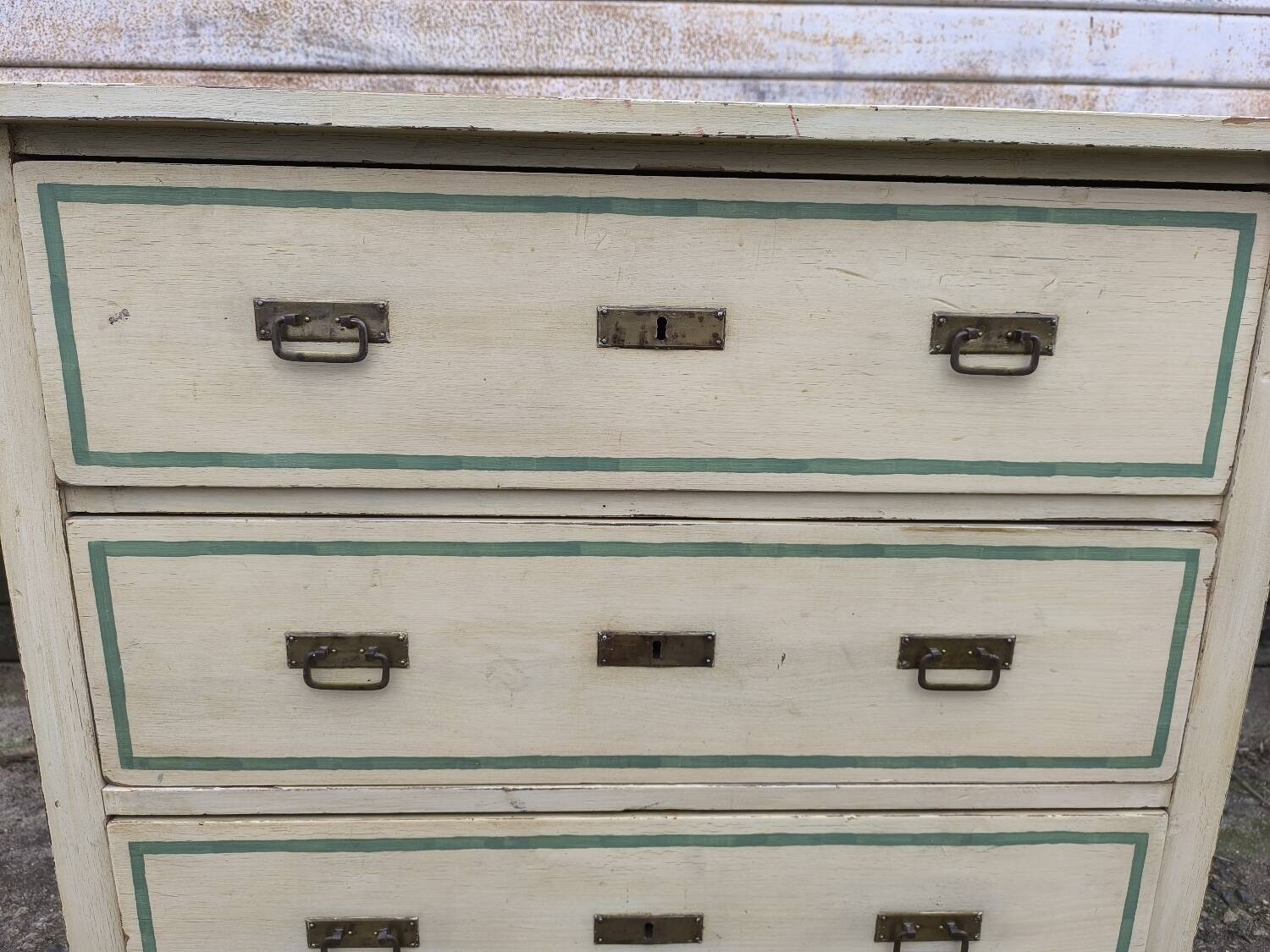 4-drawer chest of drawers with yellow and green patina by a local artist
