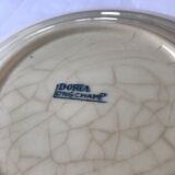 Dessert plate of the Longchamp earthenware factory, Doria model. Iron Land