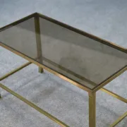 Table basse en laiton et verre fumé 1950’s