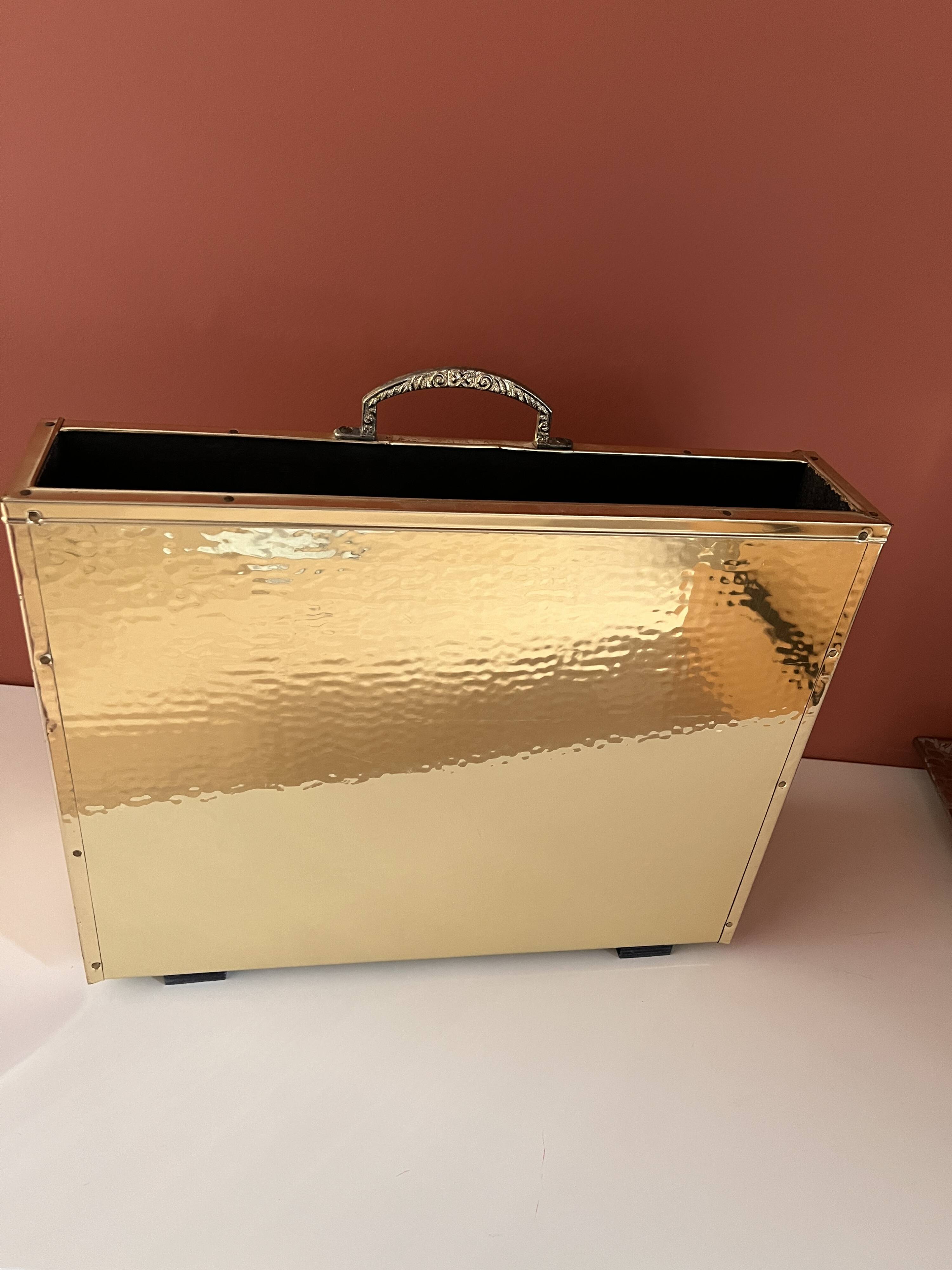 Brass and wood magazine rack in Hollywood Regency style.