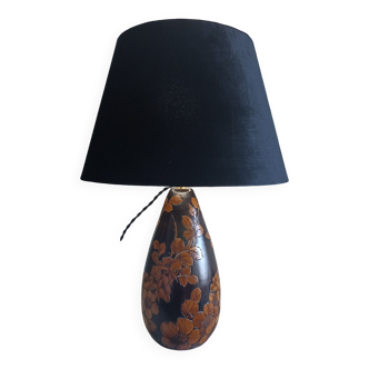 Carved wooden lamp with floral motif