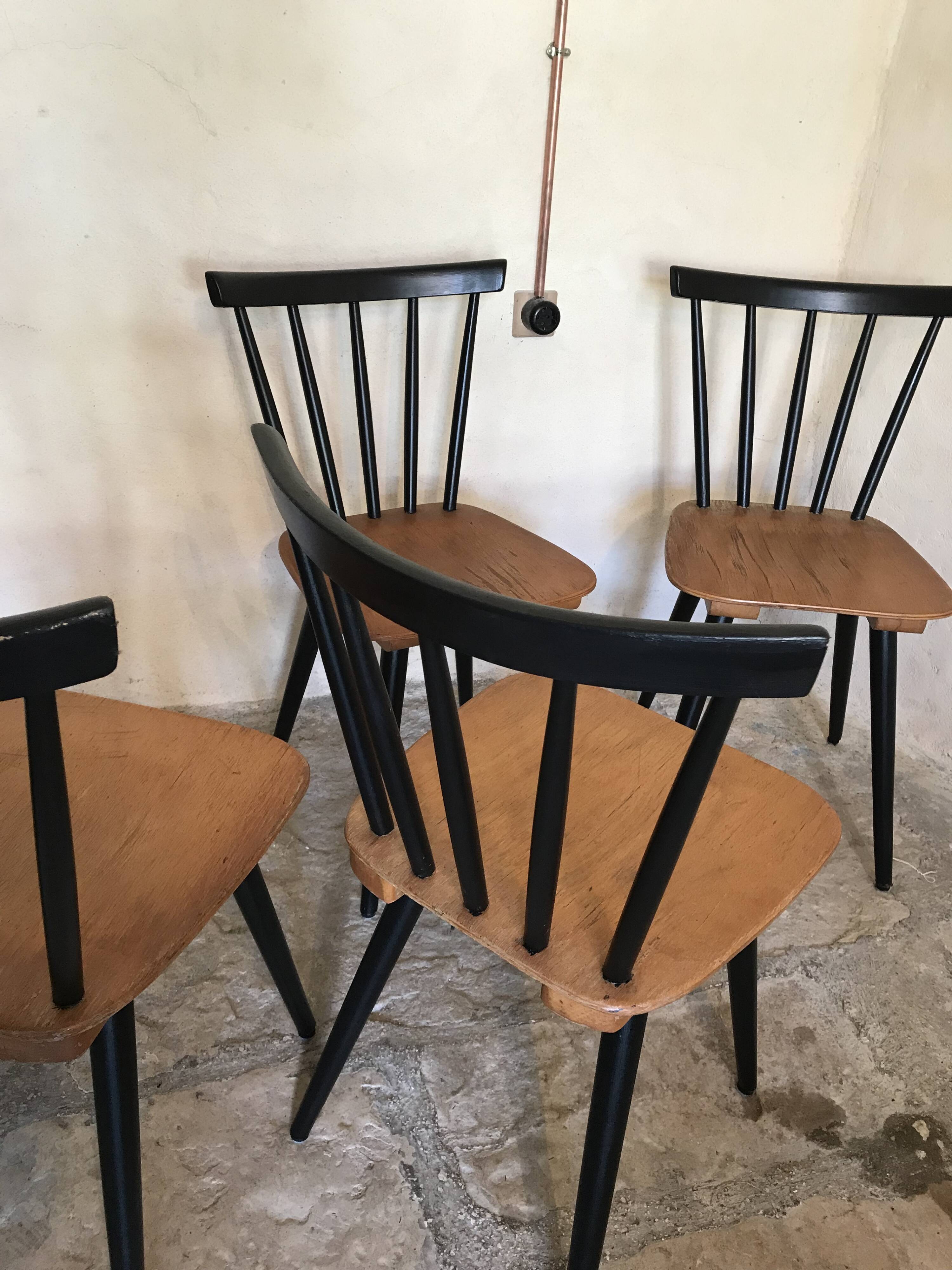 Set of 4 vintage 1960's chairs with bars and black compass legs