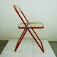 Red Plia Lucite folding chair by G. Piretti for Castelli Italy