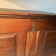 Rustic antique oak chest, original fittings and moulded panels.