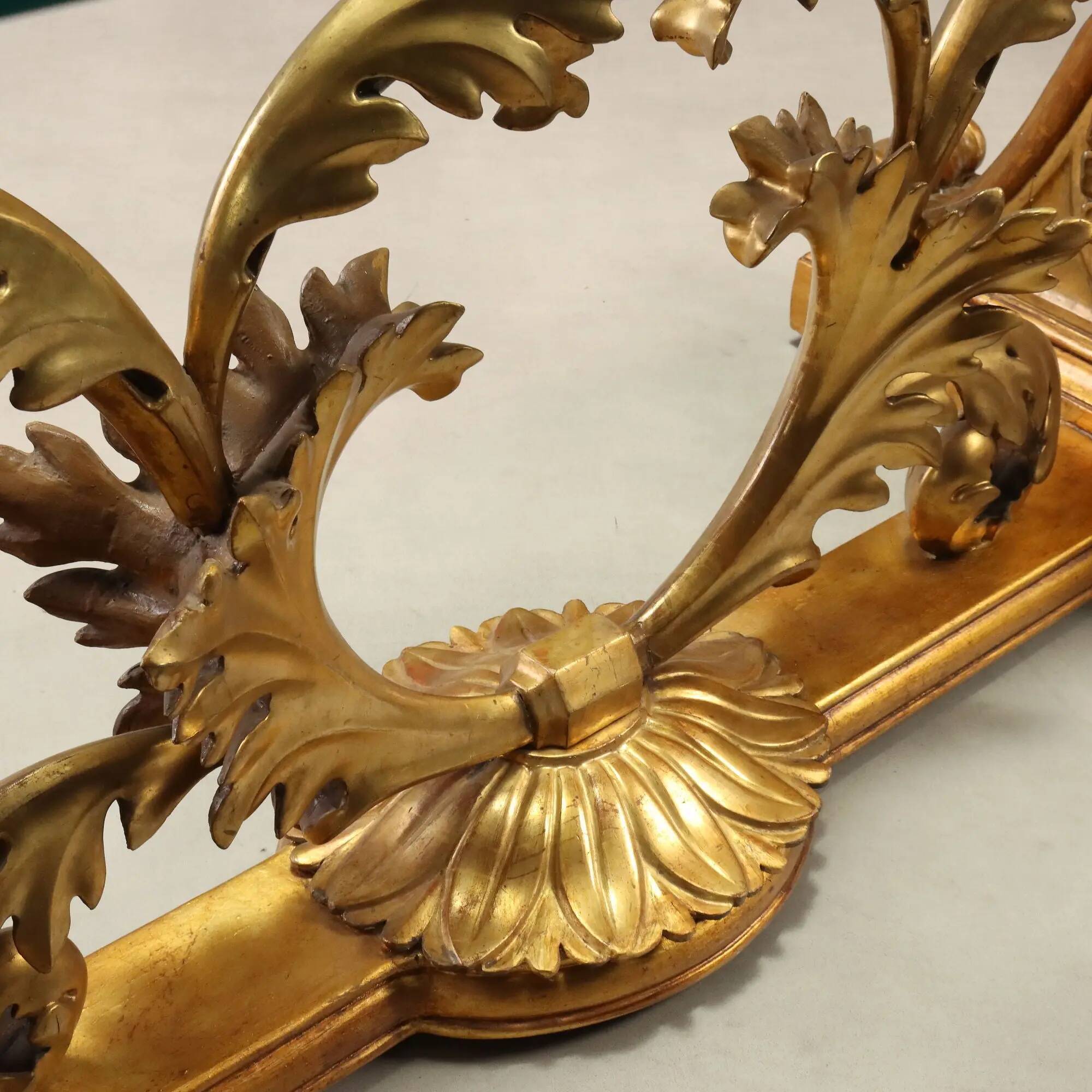 Antique coffee table in gilded wood with a glass top, Italy, 20th century.