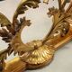 Antique coffee table in gilded wood with a glass top, Italy, 20th century.