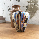 Vase dripping in varnished earth