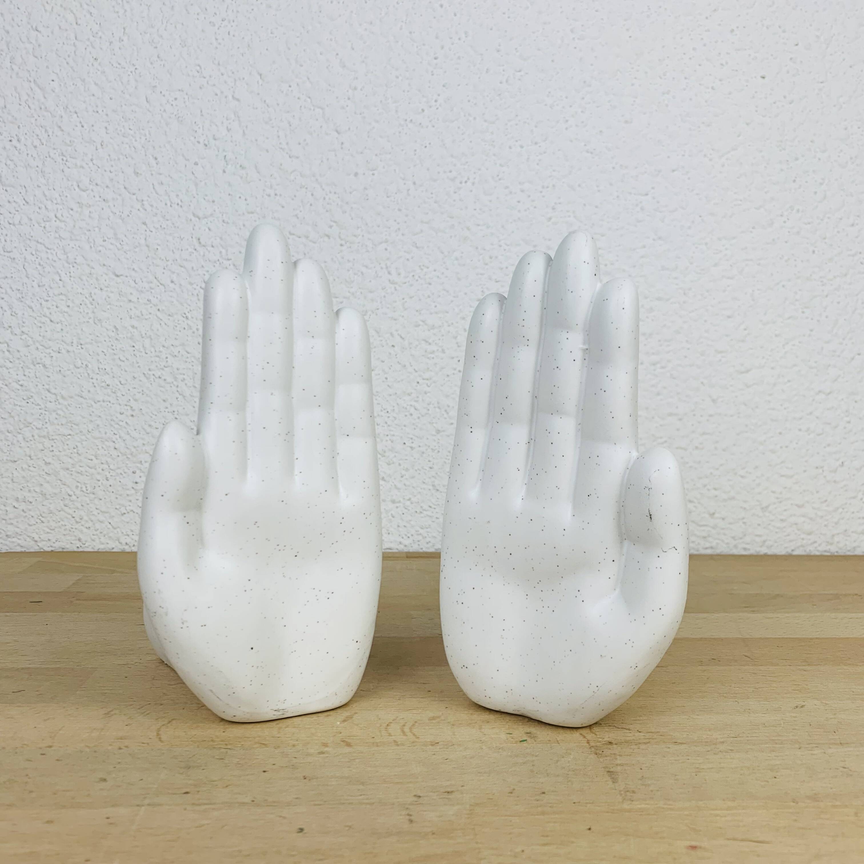 Pair of white ceramic hand bookends