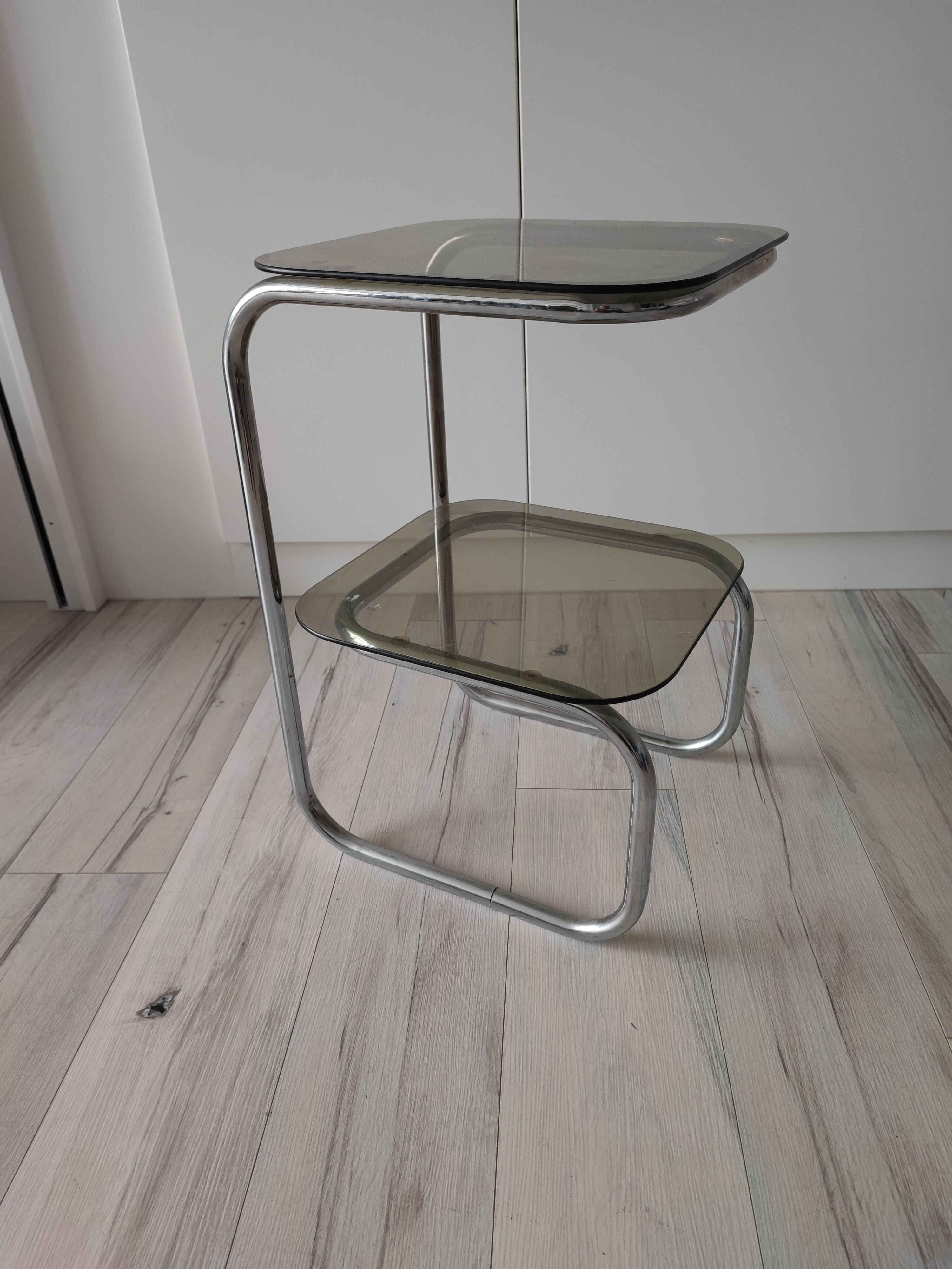 Side table or pedestal table in chrome and glass