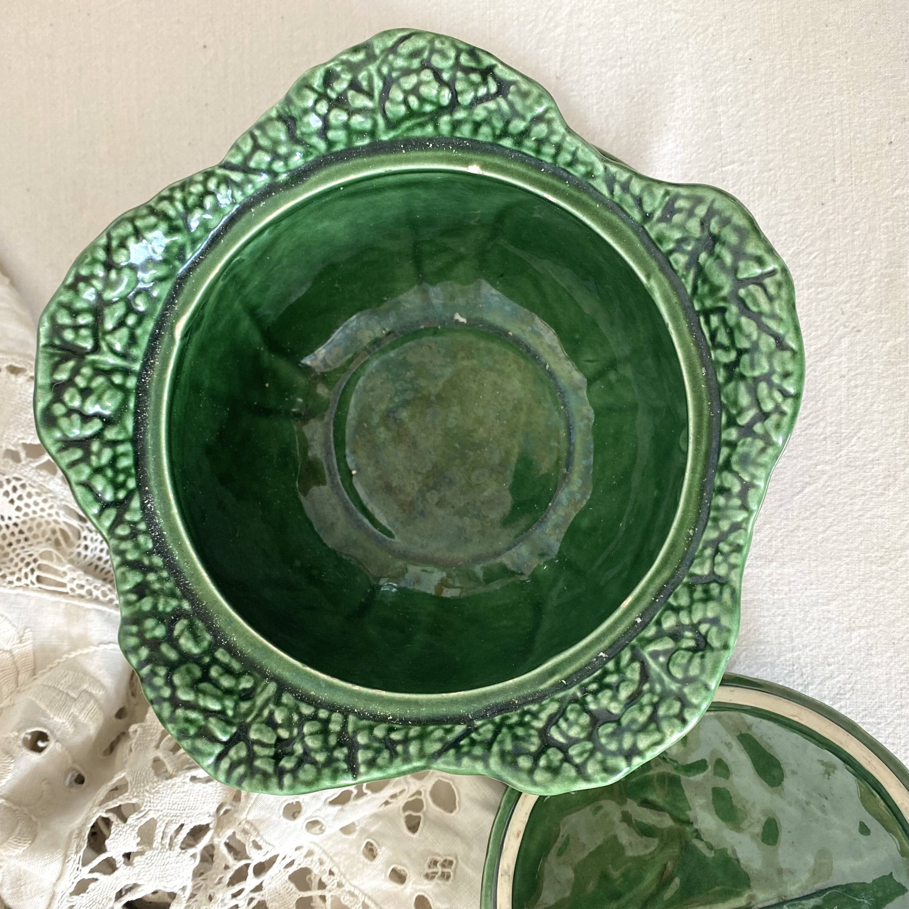 Soup tureen and green cabbage dish in barbotine