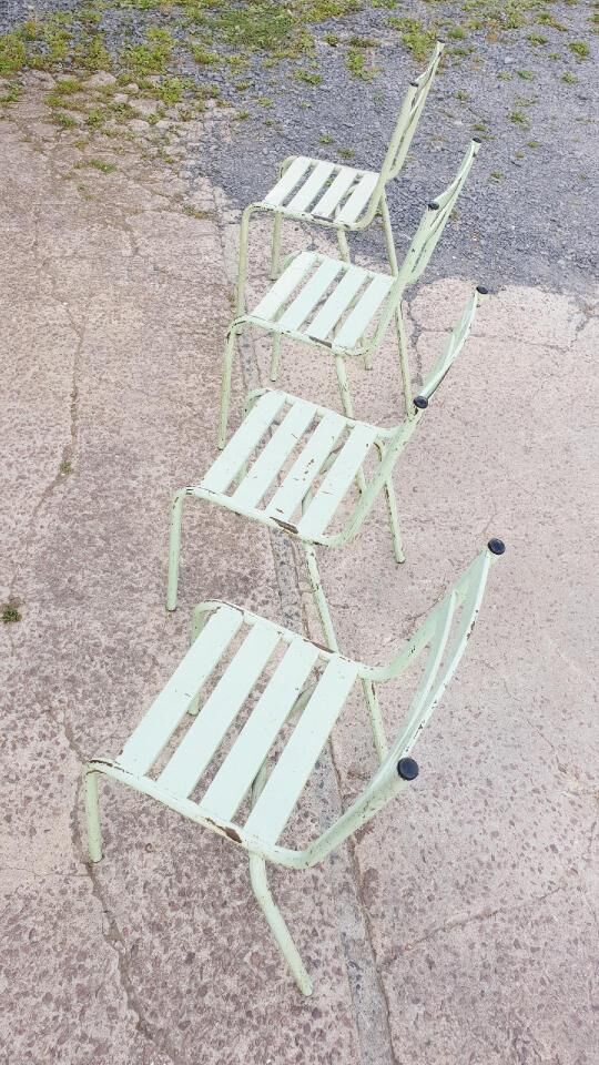 Four vintage metal chairs
