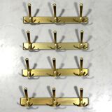 Gold coloured aluminium wall coat racks 1960’s