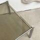 Table basse carré chrome / verre fumé