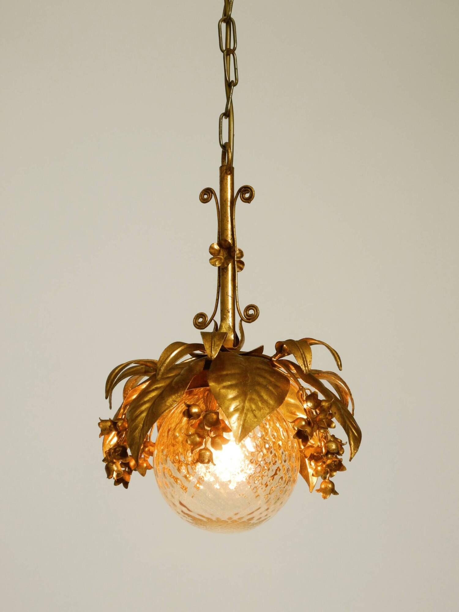 1970s gold-plated metal pendant lamp with a glass sphere by Hans Kögl