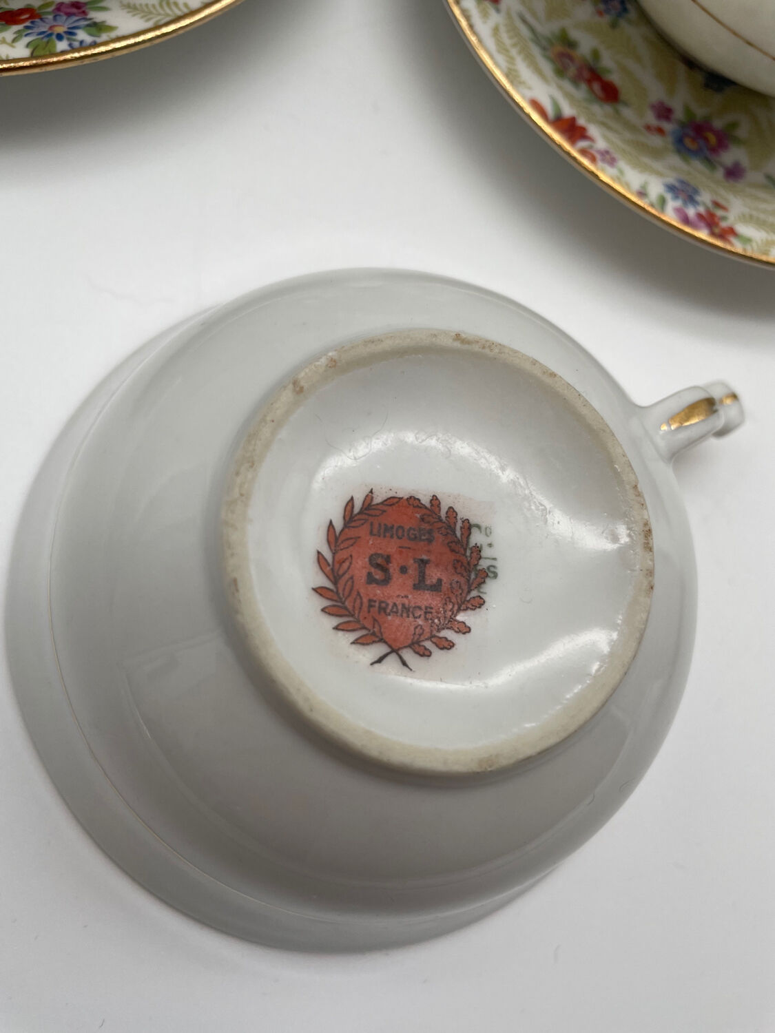 Set of 8 Limoges porcelain coffee cups from France with floral and gold pattern