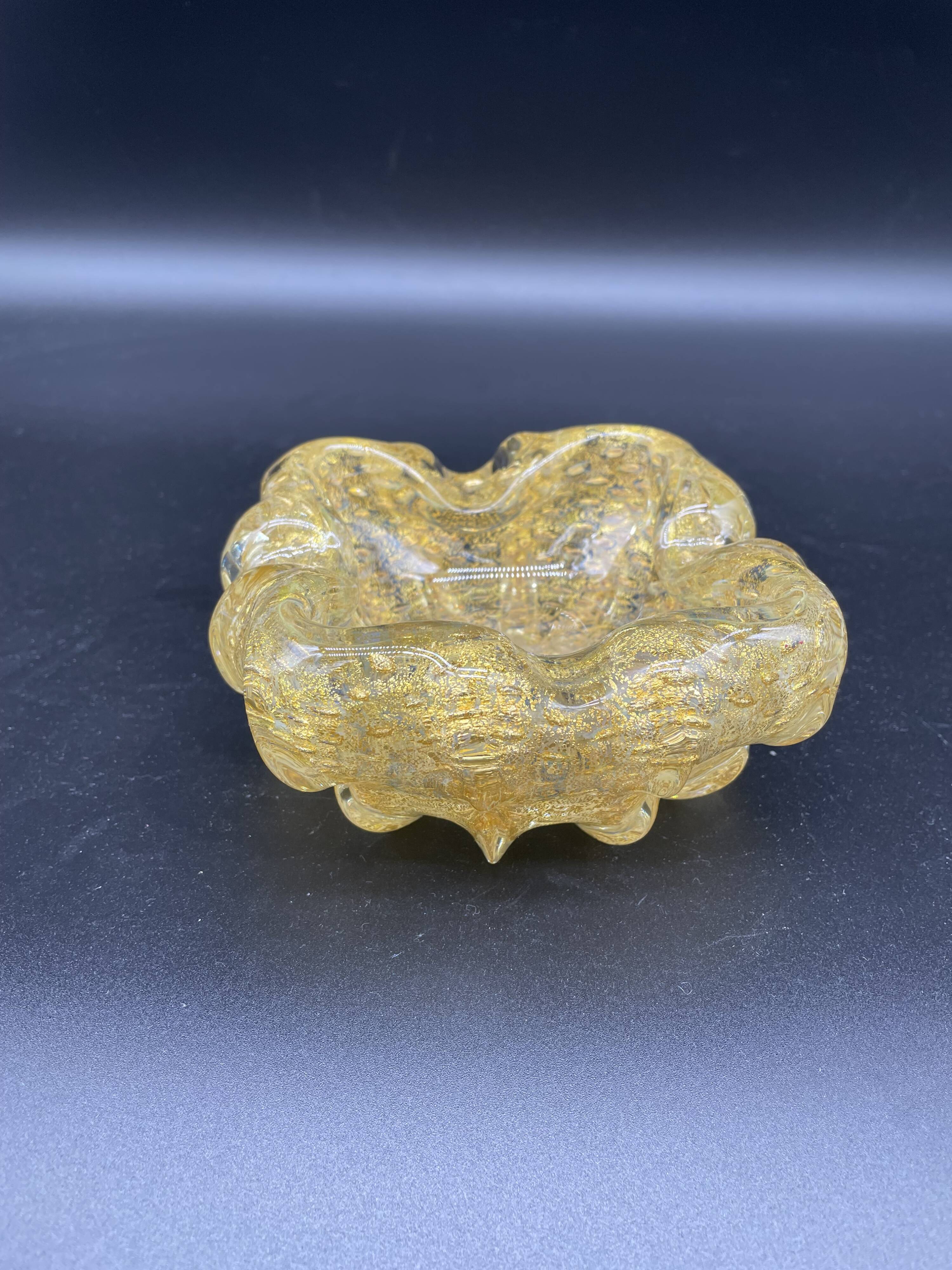 Empty pocket, Murano, Archimedes Seguso, yellow, gold, bubbled, stylized flower-forming, blown glass, Italy
