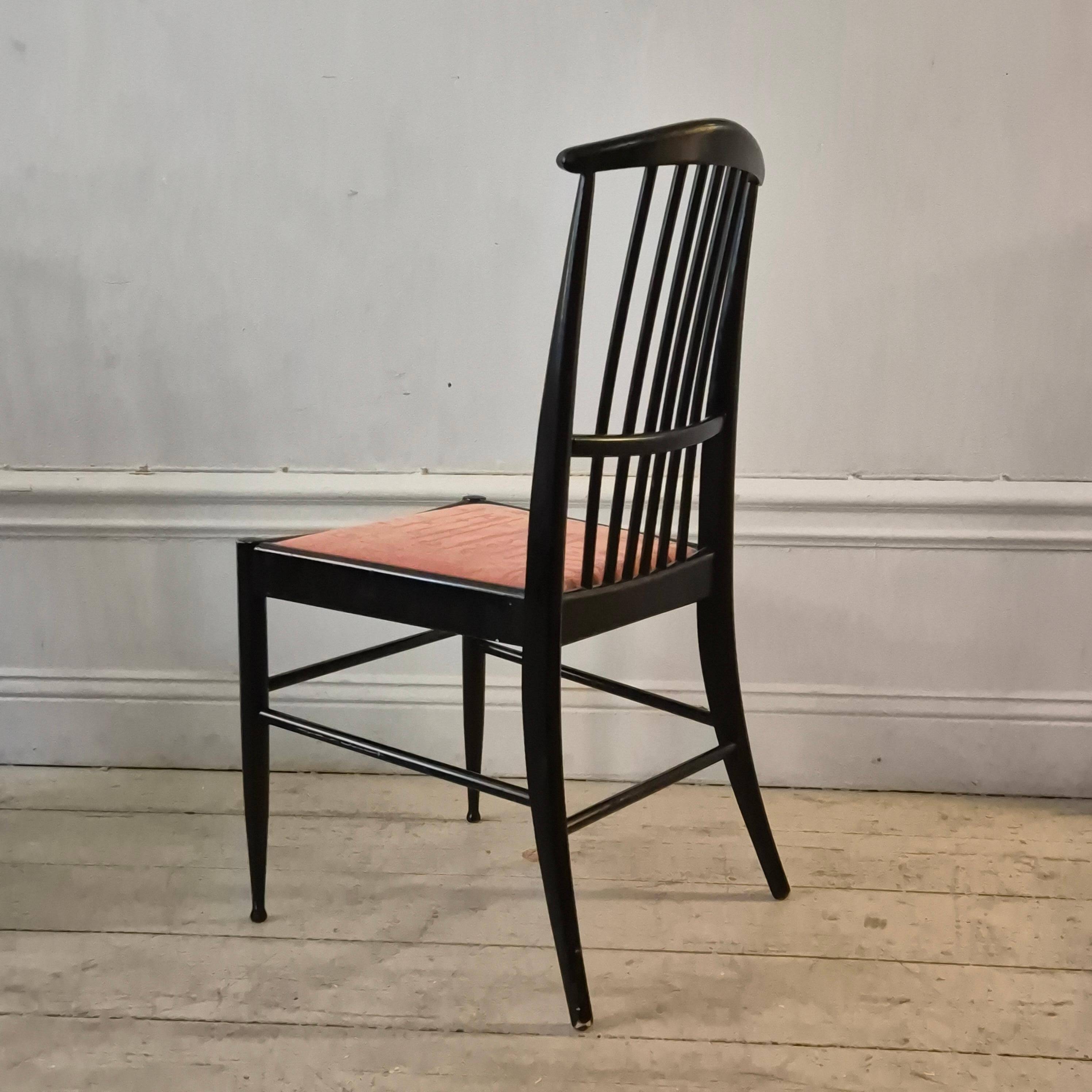 The Modernity, set of six chairs, model Charlotte, black lacquered wood.
