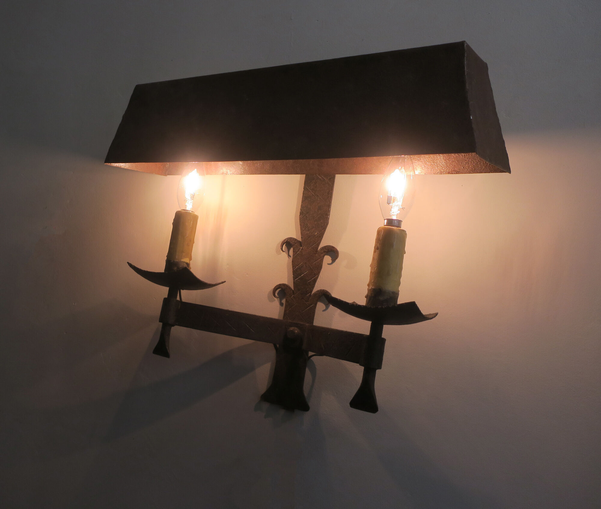 Pair of mid century patinated iron outdoor wall lights, 1960