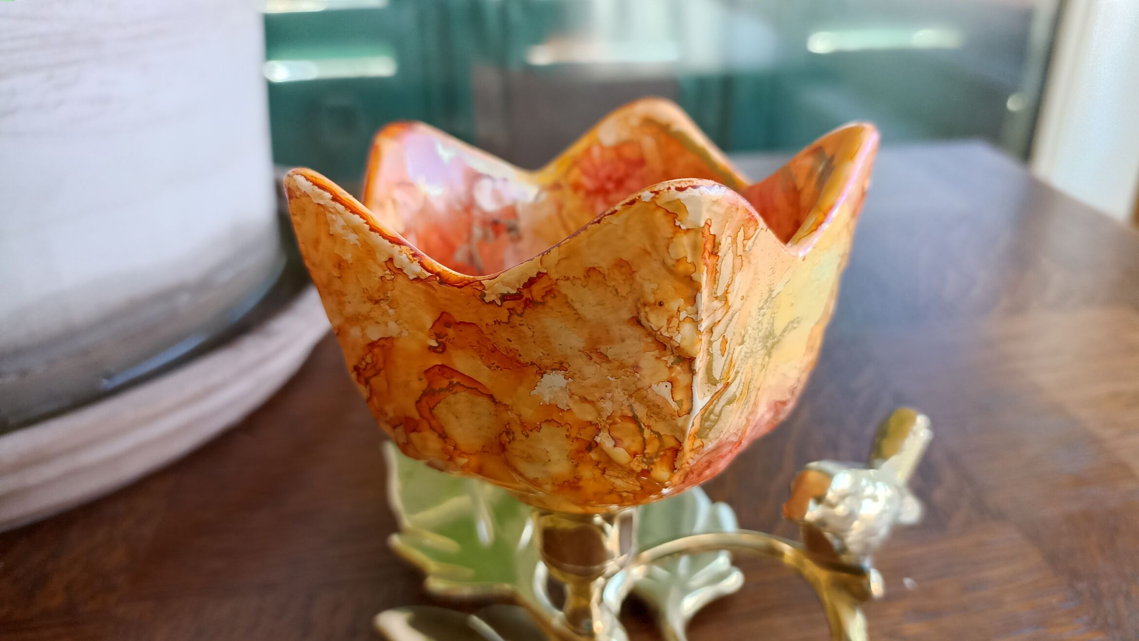 Brass cup in the shape of a bird and flowers