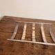 Art Deco metal plate, silvered, hammered on a flat vintage serving stand.