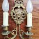 Pair of gilded bronze sconces decorated with Louis XIV style mascarons