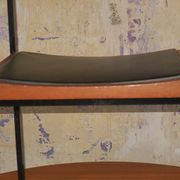 Pair of teak and iron stacking chairs, 1960s