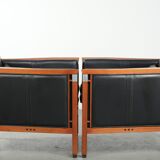 Set of 2 black leather Art Deco design armchairs in good condition