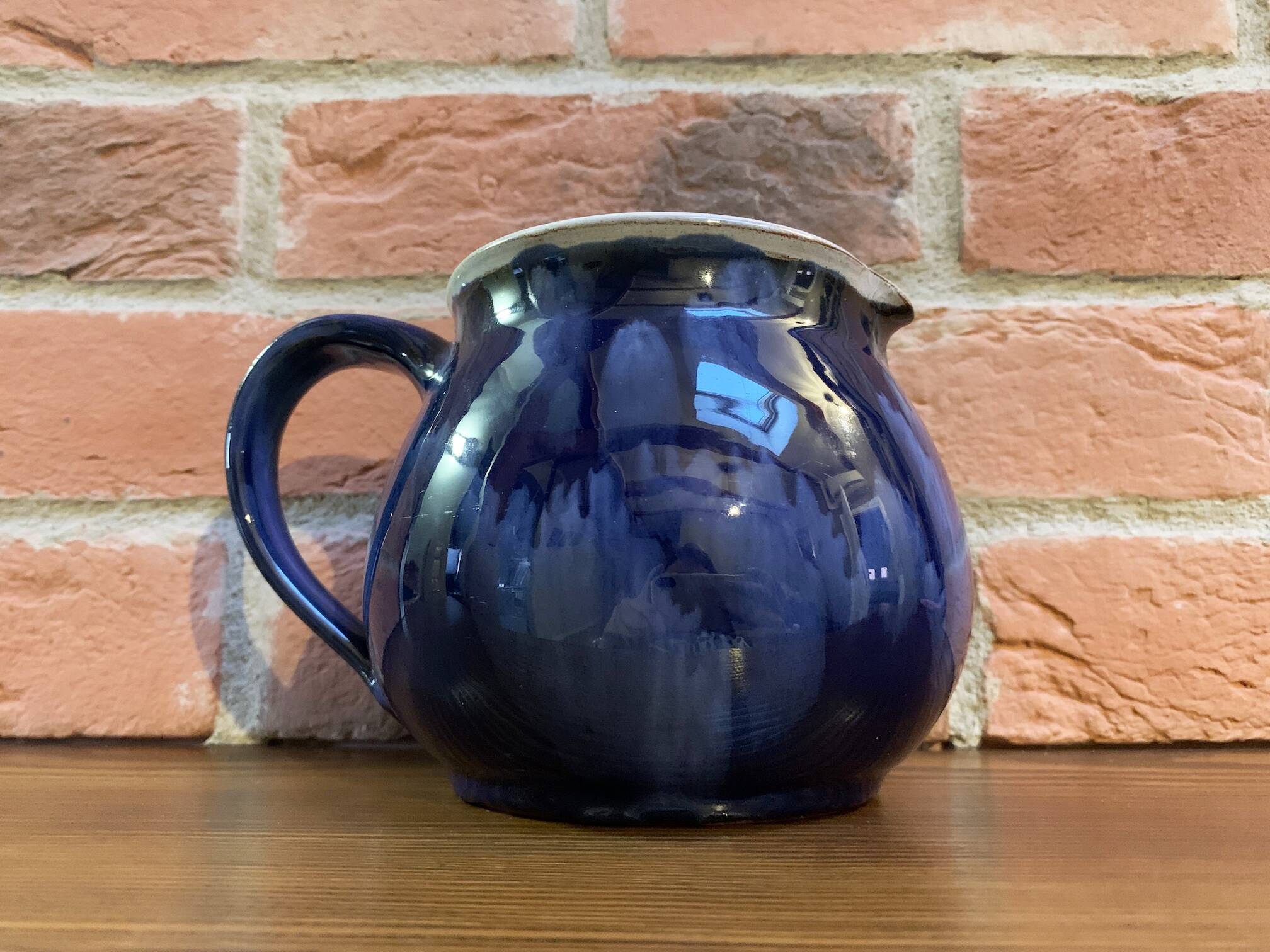 Navy Blue and White German Pitcher Made in Rügen, Drip Glaze Pottery