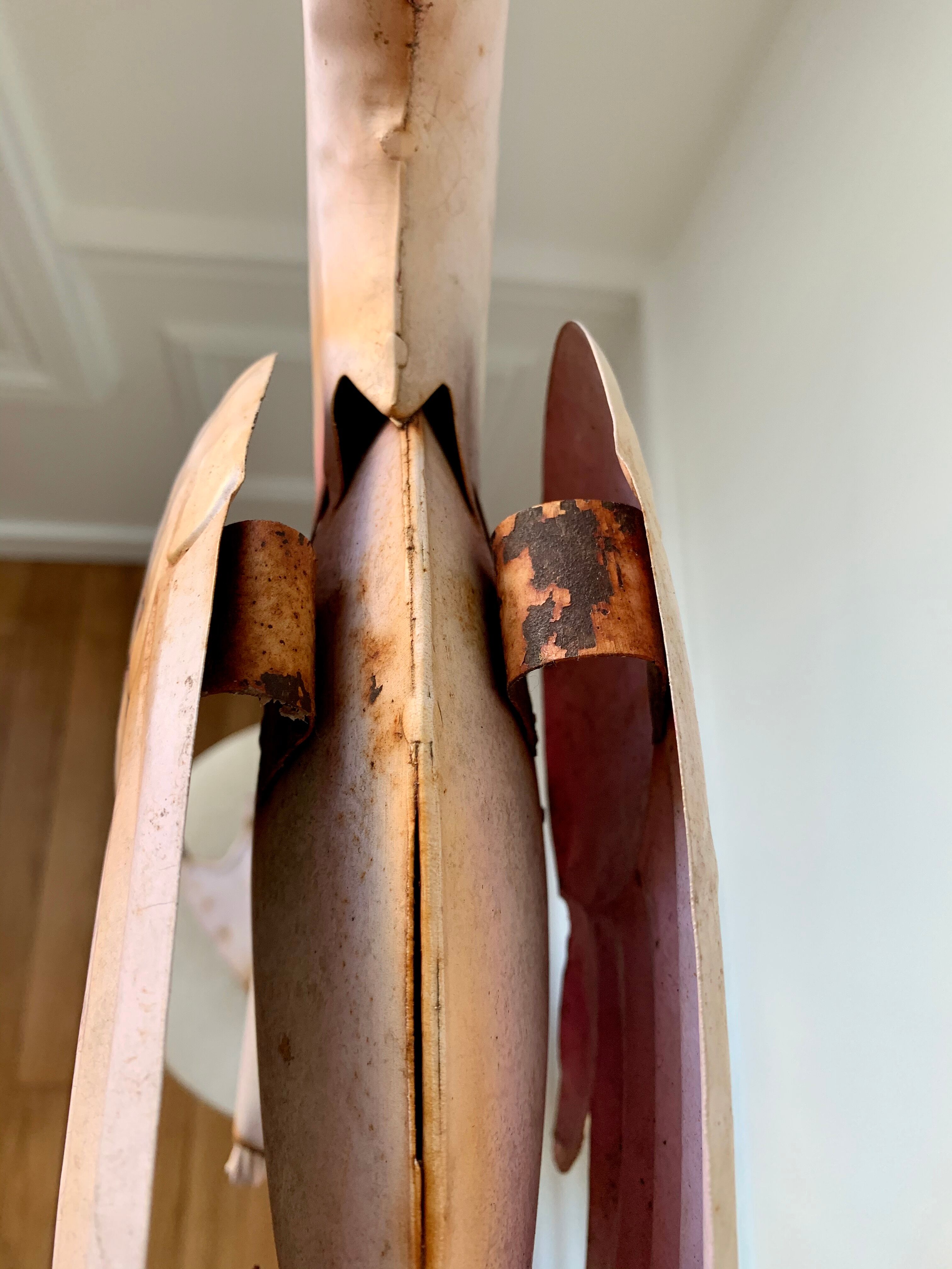 Old decorative pink flame in painted metal