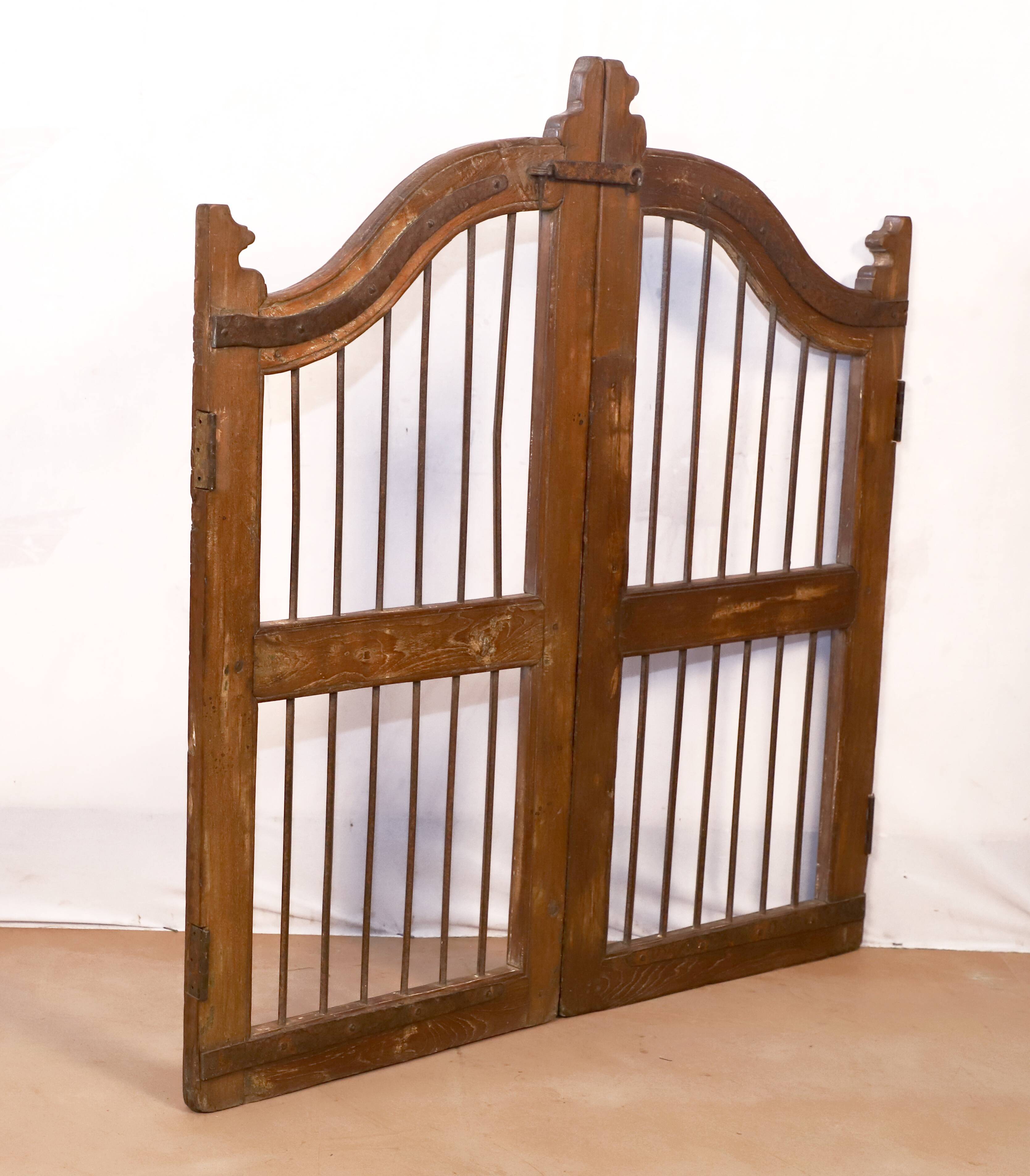 Old Burmese teak gate with openwork wrought iron panels
