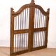 Old Burmese teak gate with openwork wrought iron panels