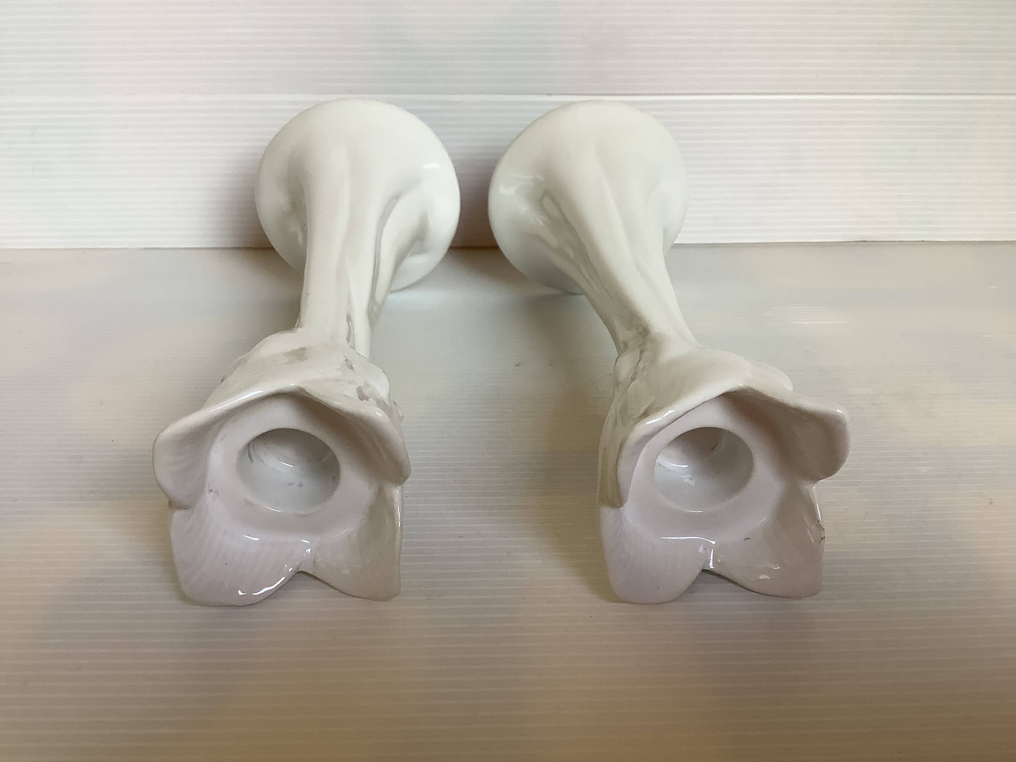 Pair of tulip candlesticks