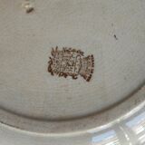 Plat rond en terre de fer Jules Vieillard
