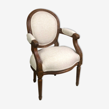 Louis XVI style children's armchair in carved walnut and beige antique upholstery