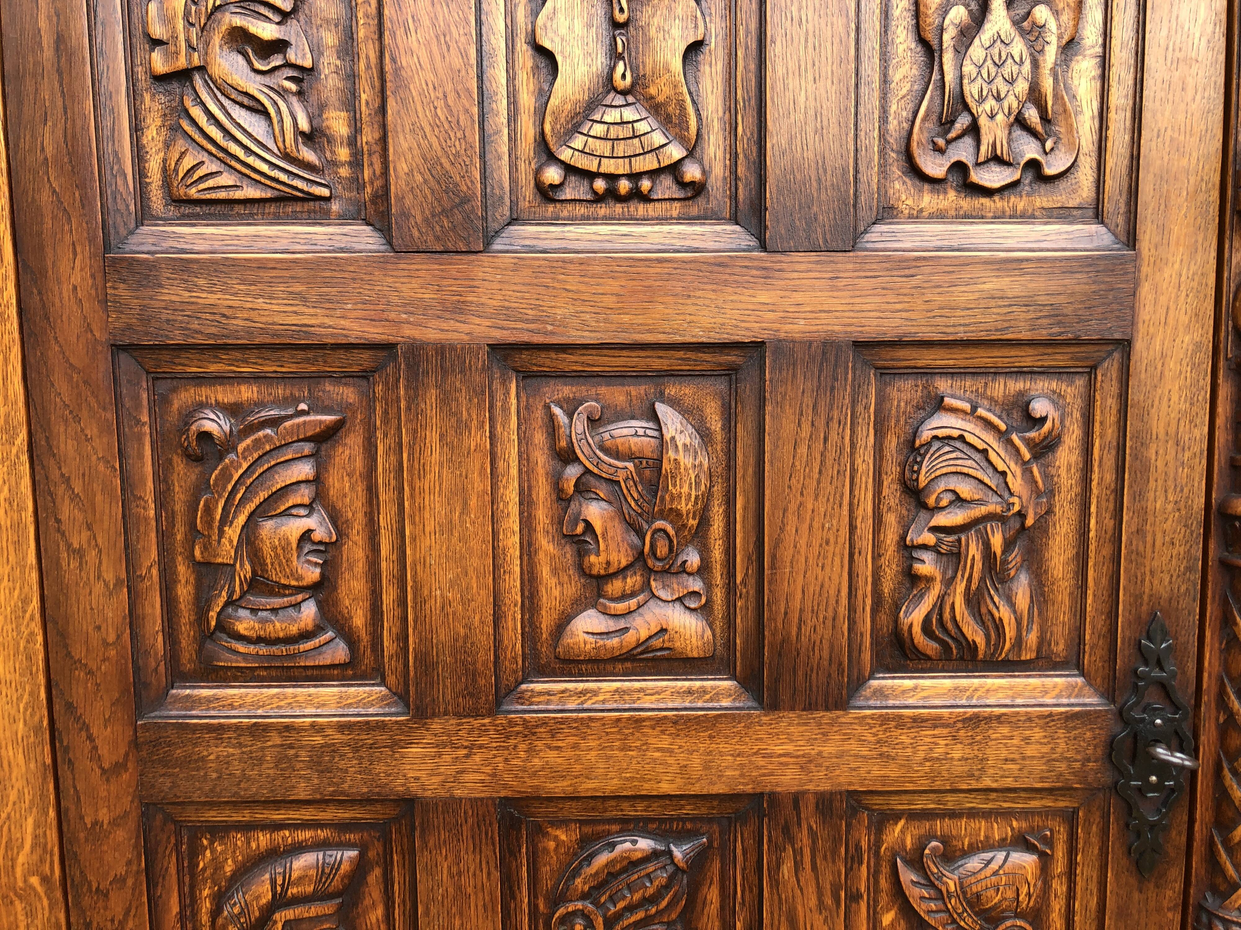 Spanish furniture with carved wood profiles and coats of arms from the 1950s.
